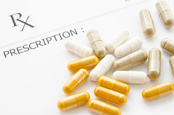 Herb capsules on Prescription form.