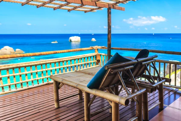 Bamboo hut over crystal clear sea