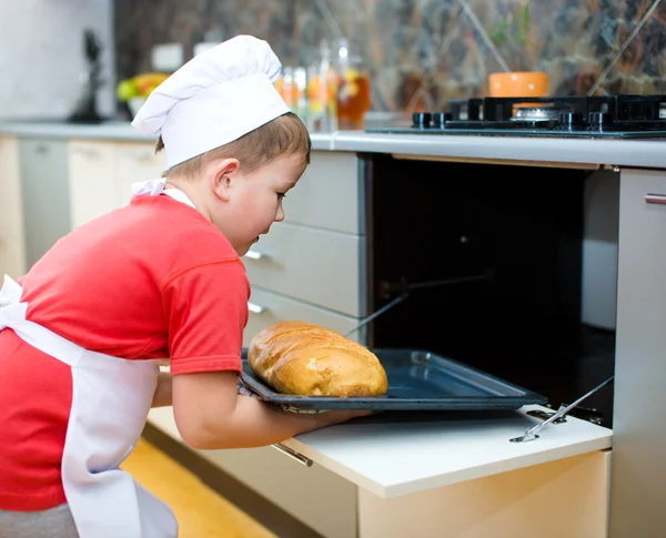 Boy making bread