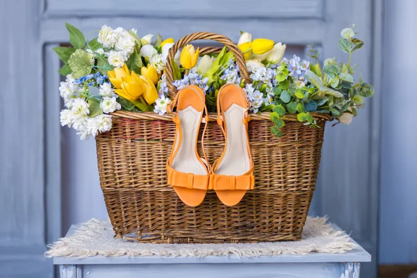 Wedding Shoes In Basket Of Flowers