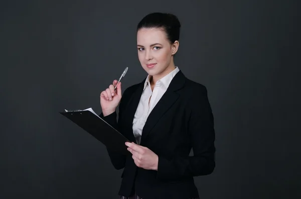 Beautiful young businesswoman with document case