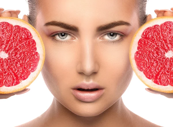 美丽的水果的年轻女子的画像 - 图库照片Neon