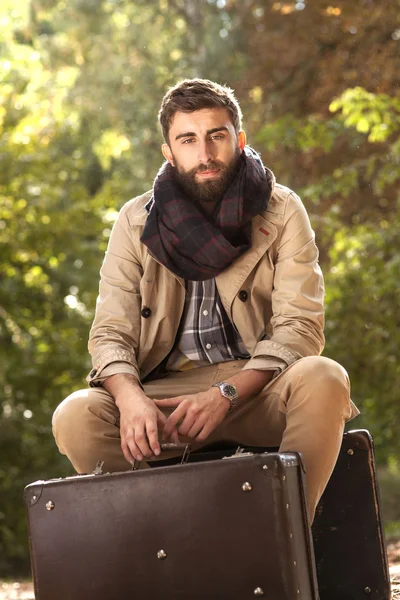 Fashionable men posing outdoor.