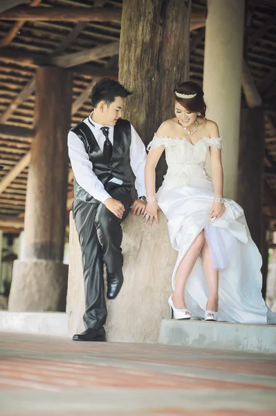 Asia young stylish fashion couple posing on nature.