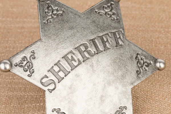 Sheriff badge.