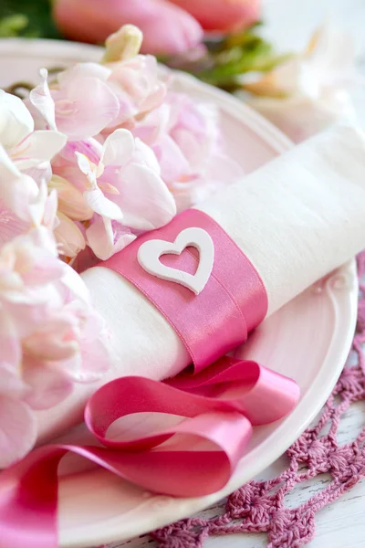 Festive wedding table setting in pink