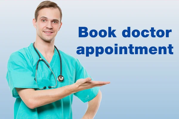 Healthcare, profession, symbols, people and medicine concept - smiling male doctor  in coat over blue background with medical icons.