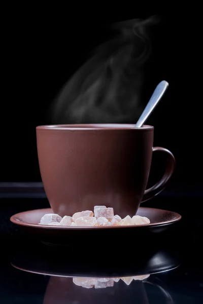 Brown cup with steam isolated