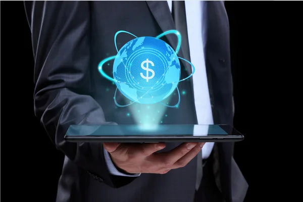 Businessman holding tablet with a projected on-screen icon online trading dollar. business Internet concept.