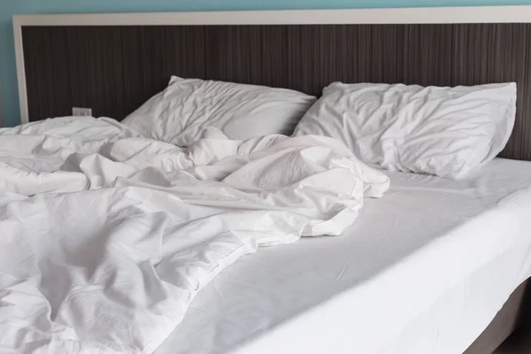 White bedding sheets and pillow, Messy bed concept