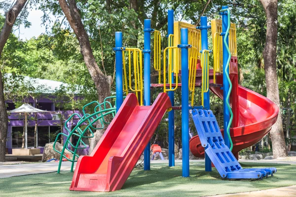 Colorful outdoor playground on yard in the park