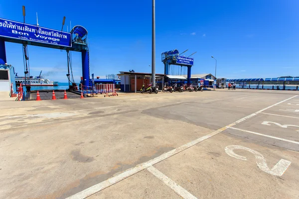 A long ferry concrete pier. The main pier of transportation from Samui island to Donsak pier and from Donsak pier to Samui island on July 16, 2014 in Suratthani, Thailand