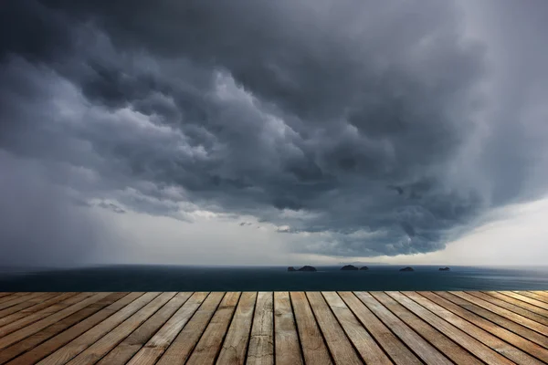 Dark clouds before raining over the sea in Thailand