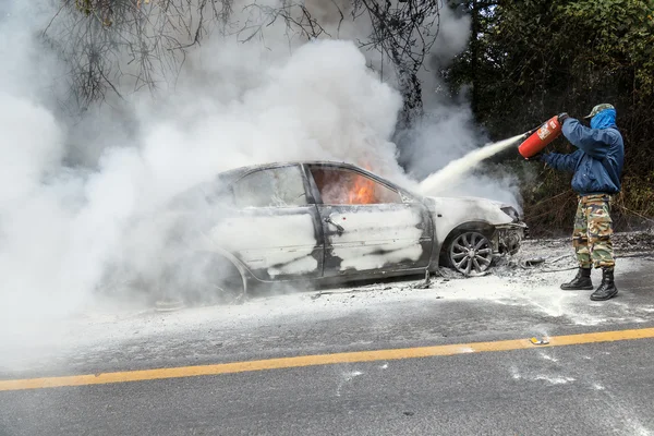 Man with fire extinguisher