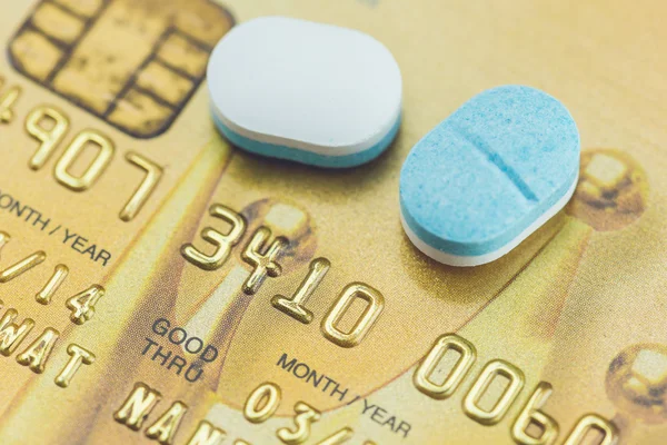 Credit card and pills