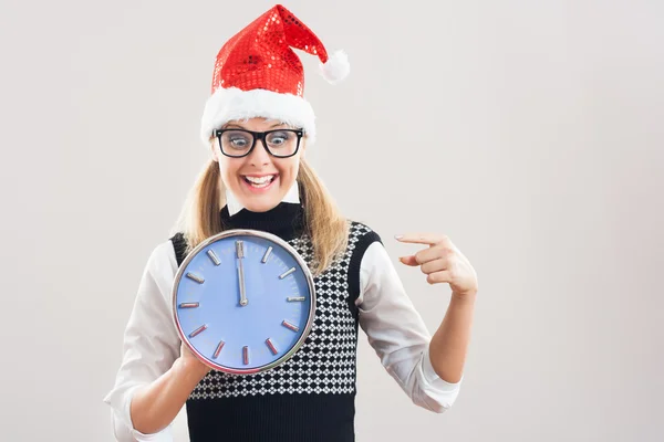 Nerdy woman in panic holding watch