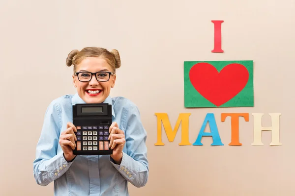 Happy student holding calculator