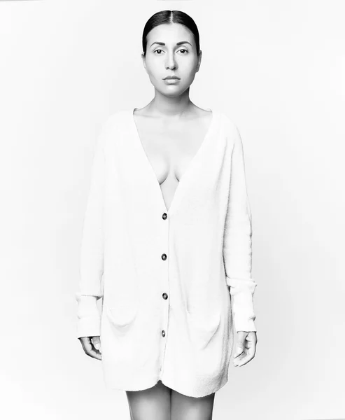 Fashion art studio photo of elegant lady in beige cardigan