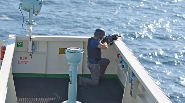 OPEN SEA / ON BOARD A SHIP / INDIAN OCEAN - JANUARY 28, 2015. Exercise of Armed Piracy Security Team on board of ship.