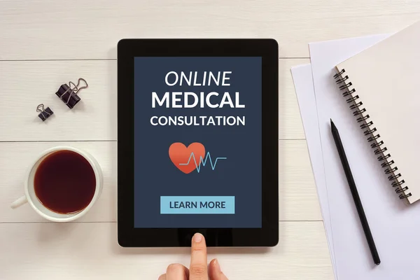 Online medical consultation concept on tablet screen with office