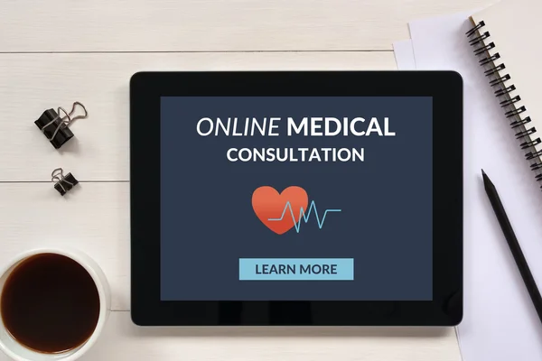 Online medical consultation concept on tablet screen with office