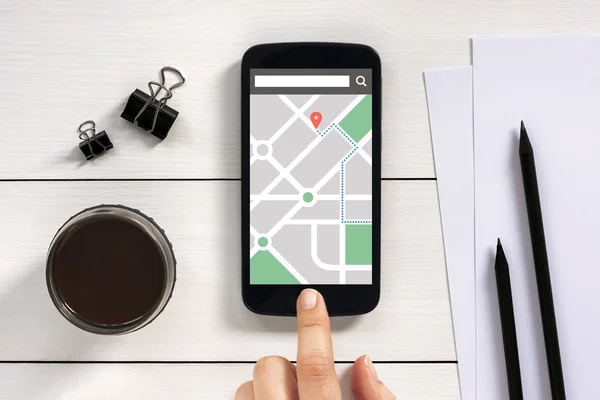 Map gps navigation application on smart phone screen with office