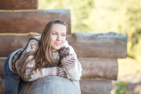 Woman in wooden house