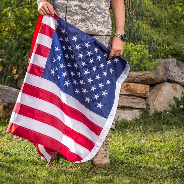 American soldier with a flag