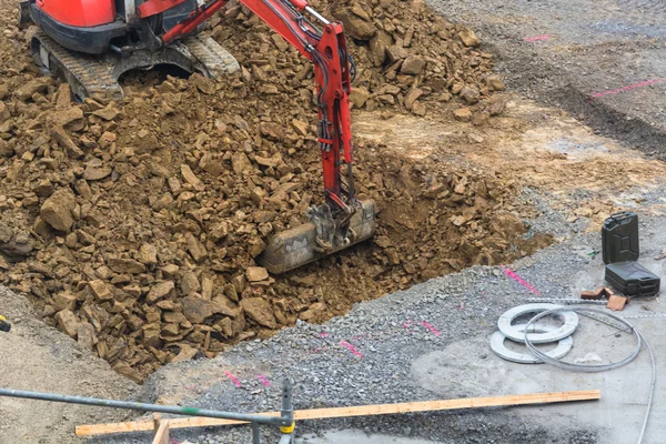 Mini excavator with excavation work