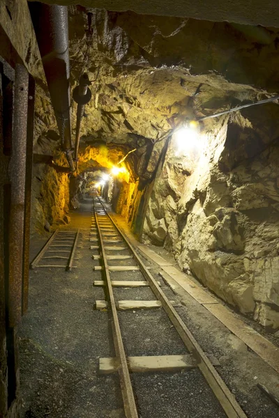 Hallway in an underground mine with tracks