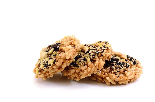 Dried rice biscuit and sprinkle ground sesame mixed with dry soy
