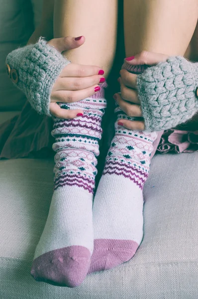 Soft photo of woman on the bed in wool