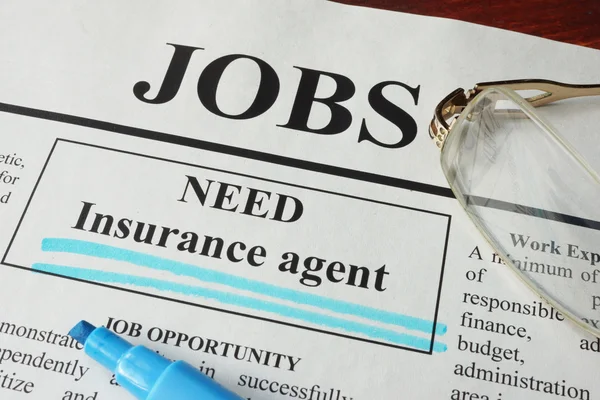 Newspaper with ads for vacancy Insurance agent.