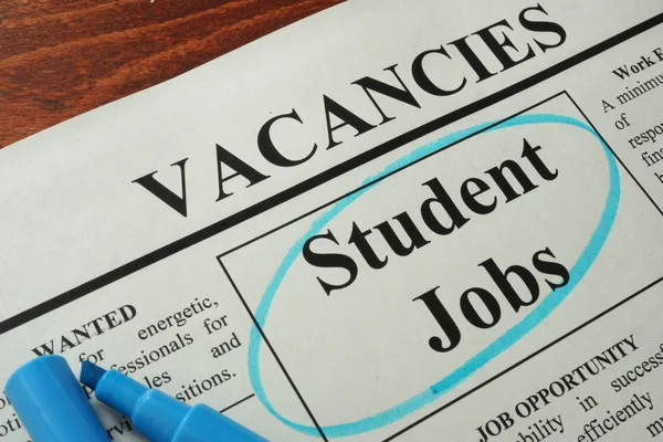 Newspaper with ads student jobs vacancy.