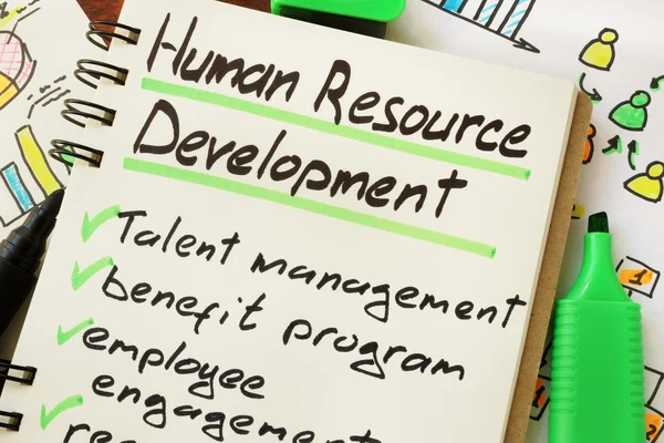 Sign human resource development on a page of notebook.
