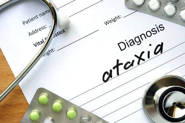 Diagnostic form with diagnosis Ataxia and pills.