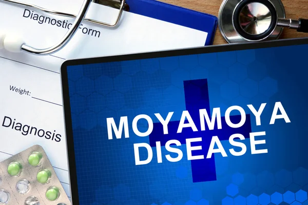 Diagnostic form with diagnosis Moyamoya disease and pills.
