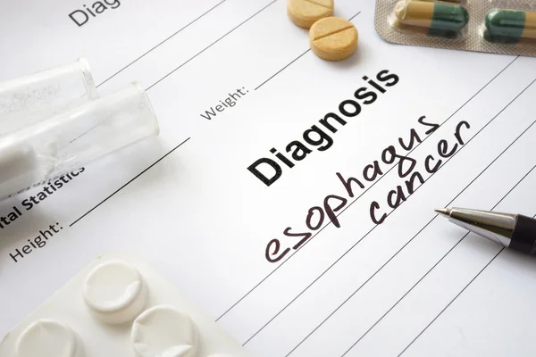 Diagnosis esophagus cancer written in the diagnostic form and pills.