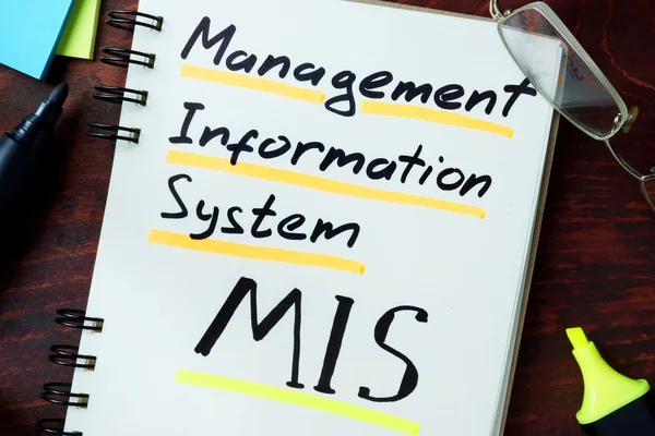 Management information system MIS  concept. Notepad on the table.