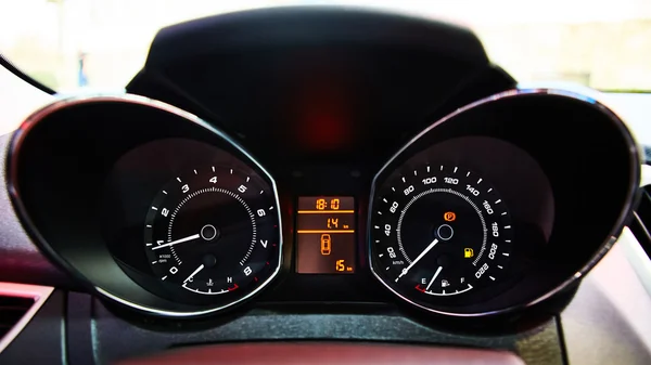 Car Dashboard. Image of illuminated car dashboard.