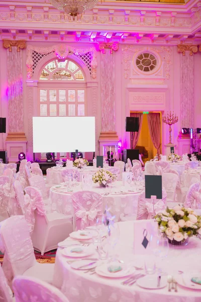 Image of tables setting at wedding hall
