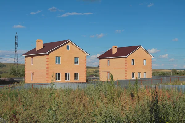 New two-storeyed country houses from brick