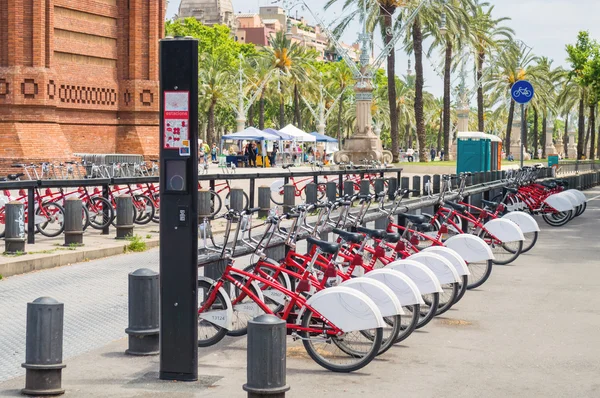 Bikes for rent on bicycle parking in Barcelona