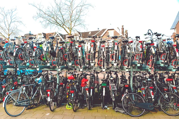 Plenty bicycles at parking lot in,Bicycles in The Netherlands, a