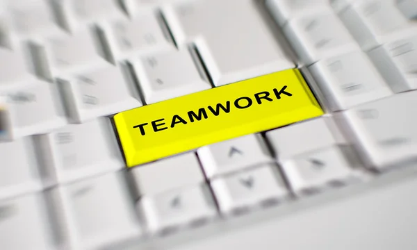 Word teamwork on computer keyboard key