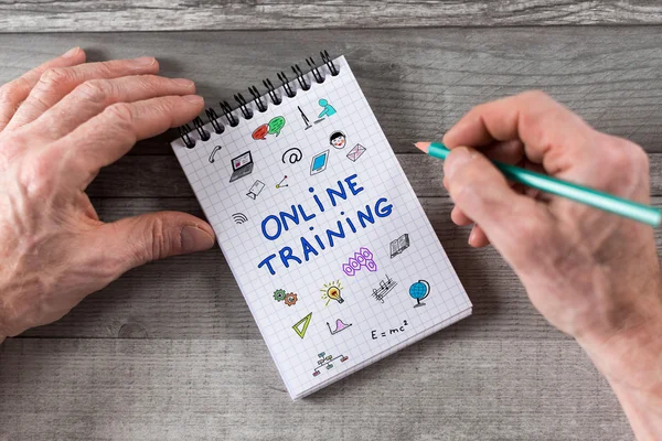 Online training concept on a notepad