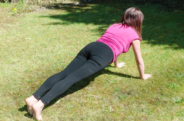 Woman doing physical exercises
