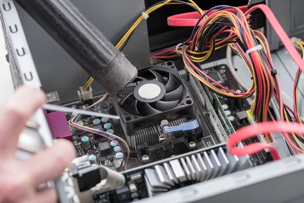Cleaning a processor fan