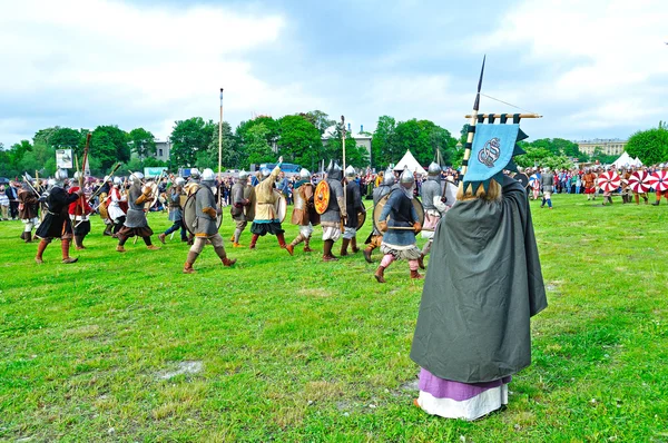 Reconstruction battle during the open air festival of Norwegian culture \