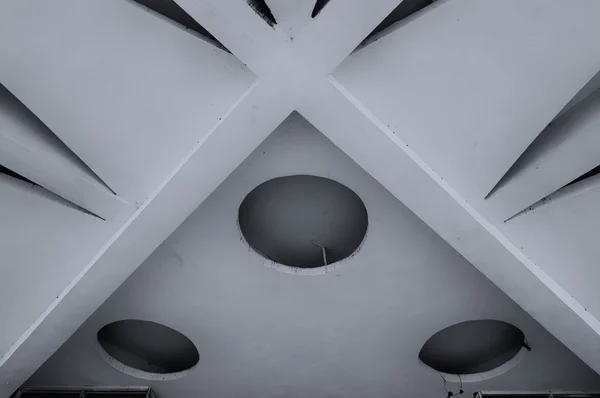 Closeup of architecture elements of stone ceiling. Architecture urban minimalist background. Black and white processing.